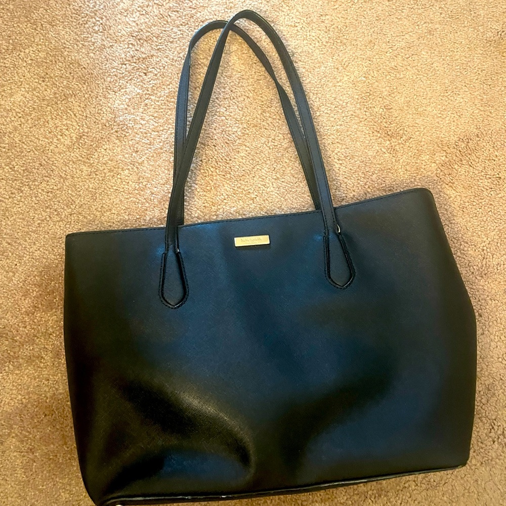 Black zip mid size Kate Spade bag